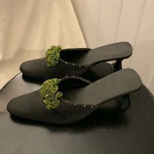 Cute kitten heals with a green accent